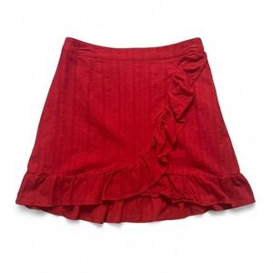 Red ruffled skirt with textured detailing